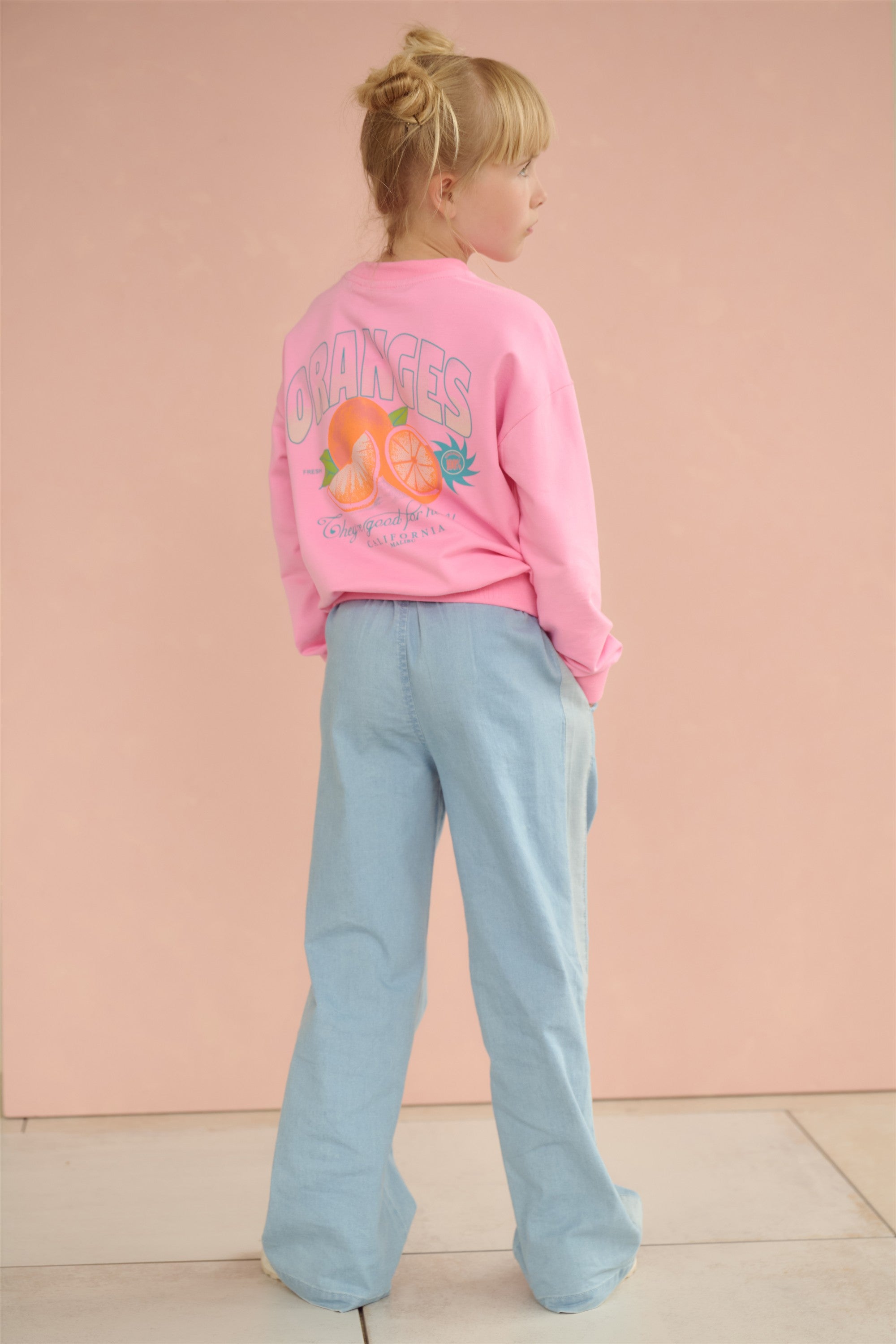 Konono Sweater with Oranged print at back